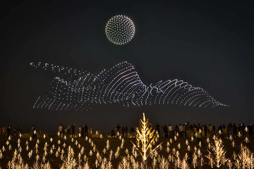 DRIFT lights up abu dhabi with whispering grass, heartbeat blooms, and 2,000-drone falcon