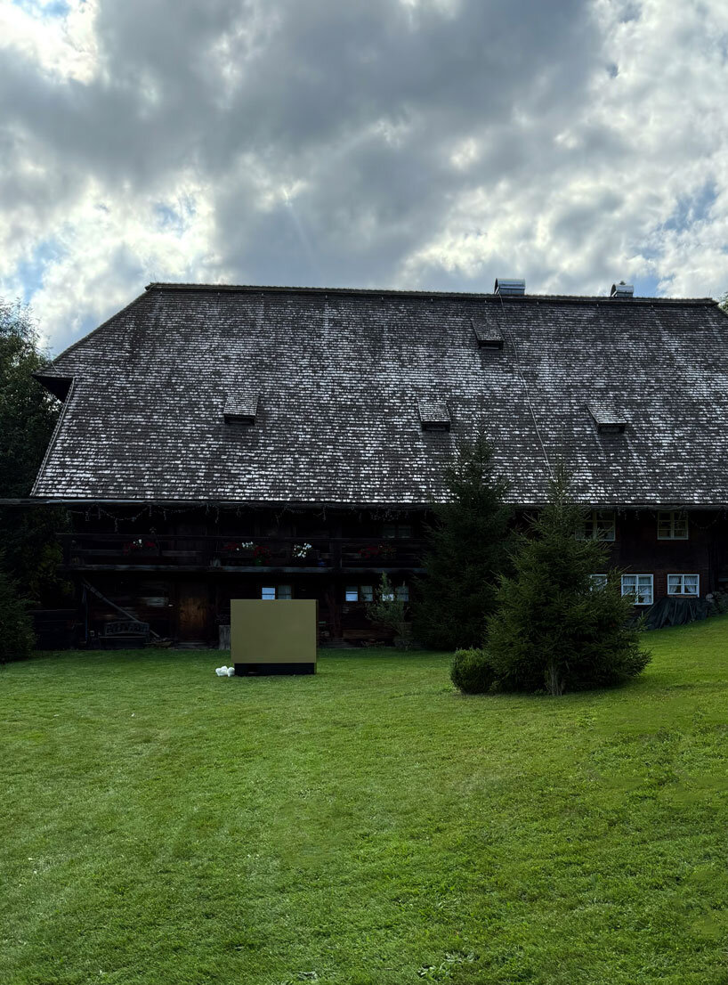 reflective gold facade wraps minimal geometric chicken coop for six fowls