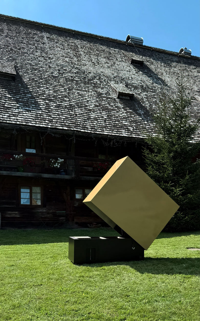 reflective gold facade wraps minimal geometric chicken coop for six fowls