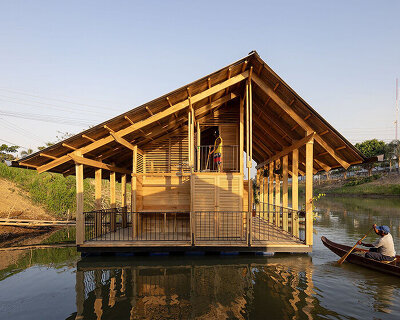 natura futura restores floating neighborhood of seven 'raft' houses in ecuador