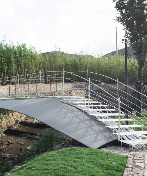 paper folding informs folio bridge's steel span over water path in china