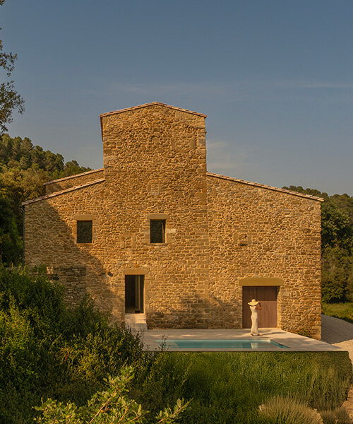 fran silvestre restores limestone farmhouse in spain as off-grid home and workspace
