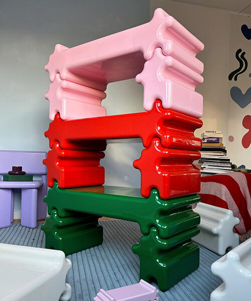 gustaf westman's stackable storage snaps together like giant glossy jigsaw pieces