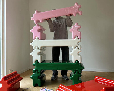 gustaf westman's stackable storage snaps together like giant glossy jigsaw pieces