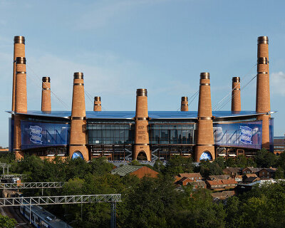 heatherwick studio plans birmingham stadium around twelve chimney-like towers