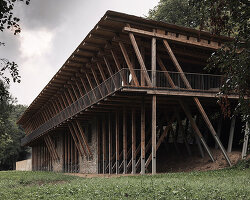 local stone and timber shape self-sufficient riverbank house by BC architects in belgium