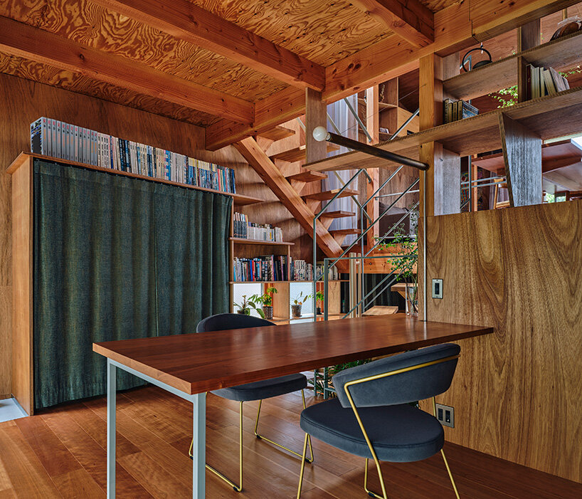 looping terrace arcs toward the street to bring daylight inside a tokyo dwelling by HOAA