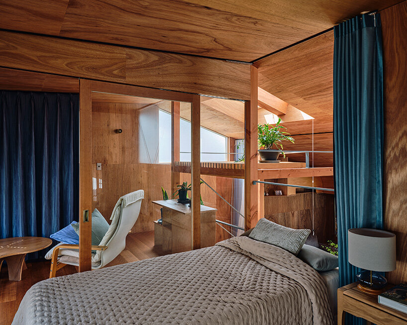 looping terrace arcs toward the street to bring daylight inside a tokyo dwelling by HOAA