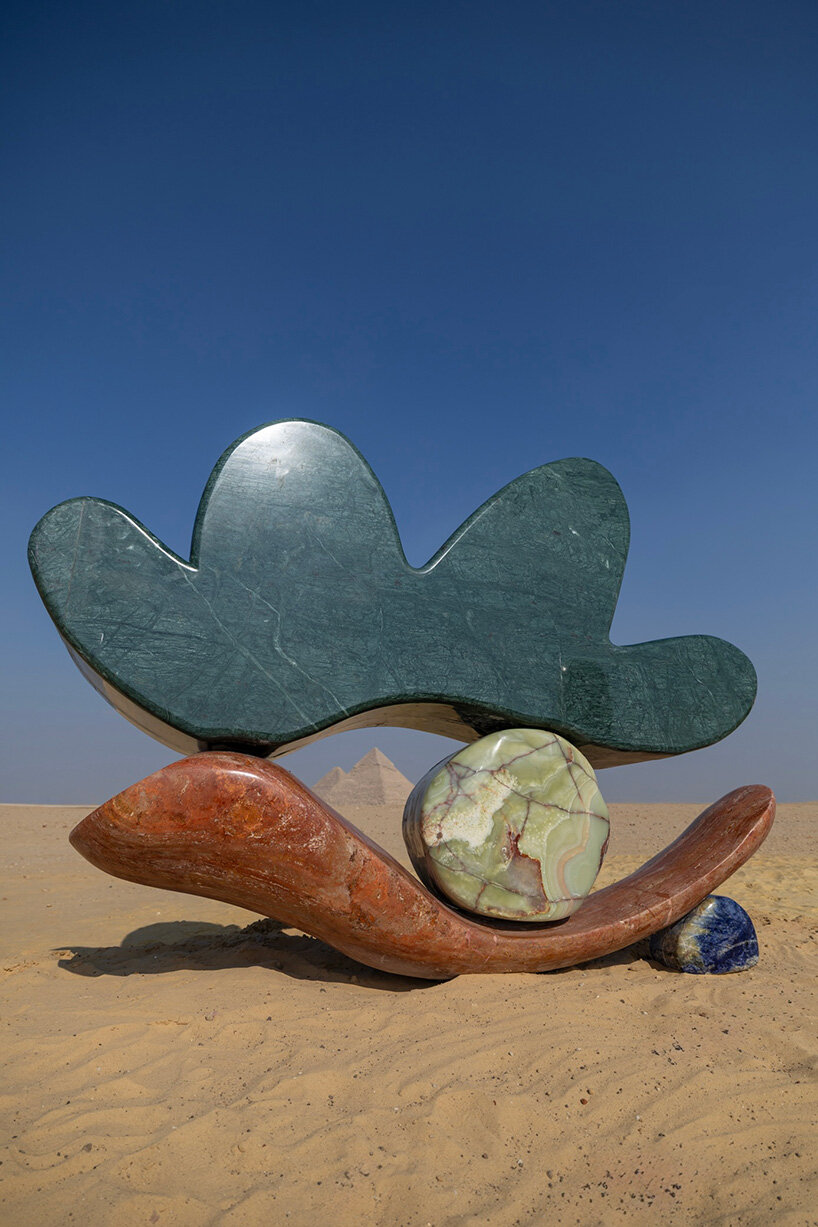 monumental sculptures in marble, onyx, travertine and quartzite emerge at the giza pyramids