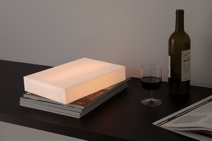naoto fukasawa turns a ream of A4 paper into limited-edition portable washi lamp
