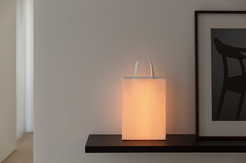 naoto fukasawa turns a ream of A4 paper into limited-edition portable washi lamp