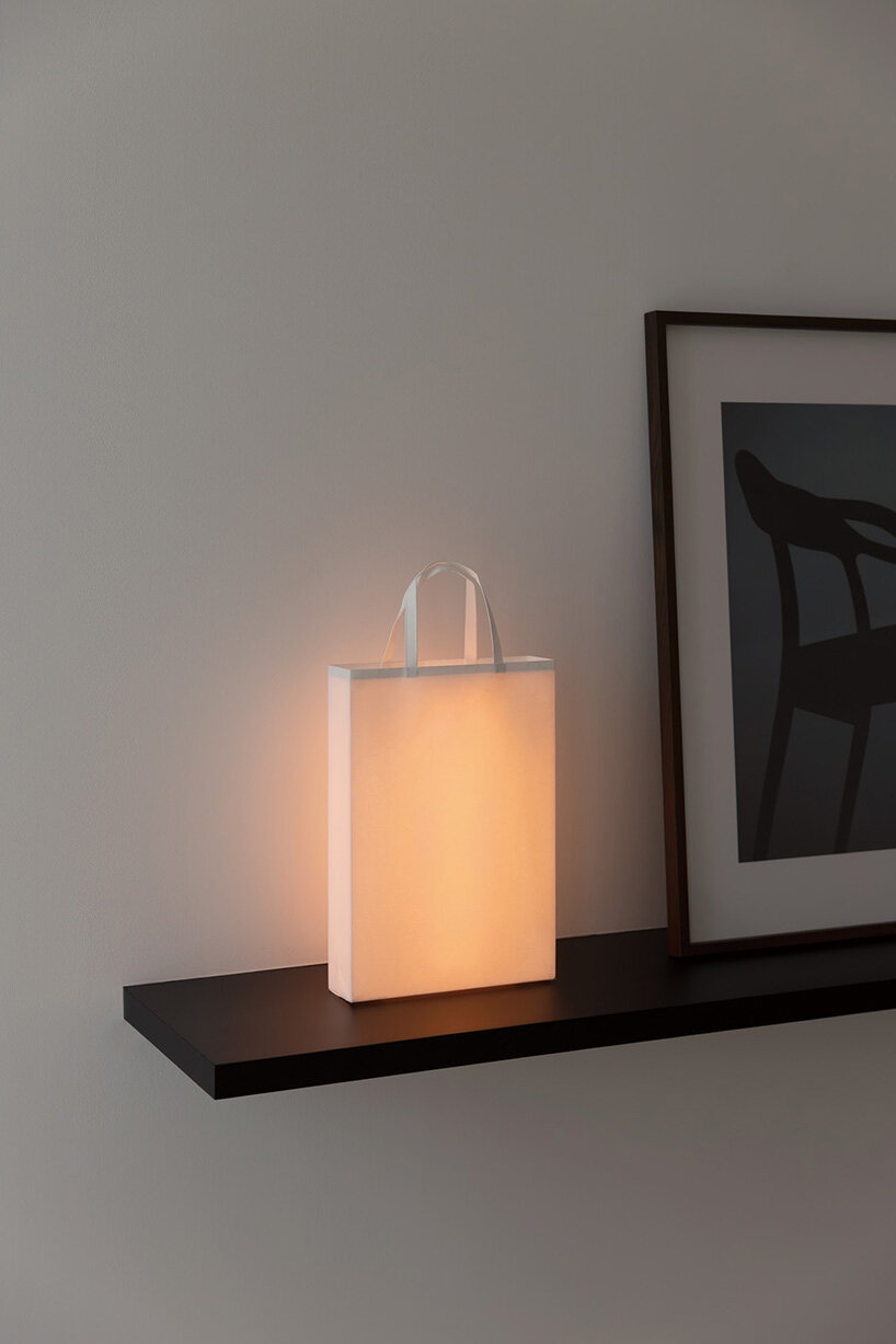 naoto fukasawa turns a ream of A4 paper into limited-edition portable washi lamp