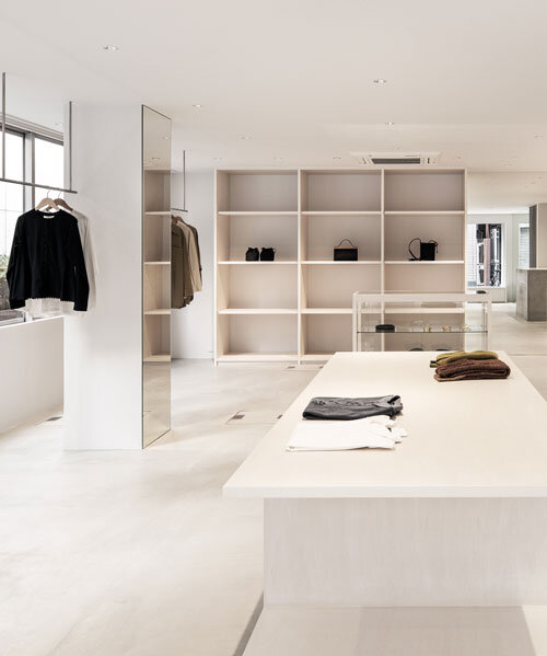 white-stained wood shapes soft bright interiors for tokyo apparel store