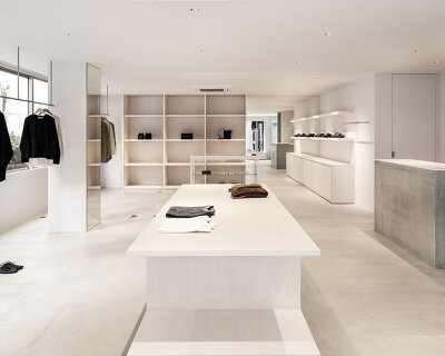 white-stained wood shapes soft bright interiors for tokyo apparel store