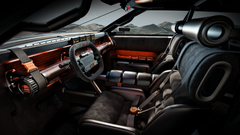 the steering wheel has a center pixel display and quick-access buttons for terrain modes