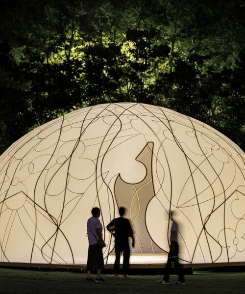 translucent illuminating dome bears bronze lattice of flower motifs in shanghai