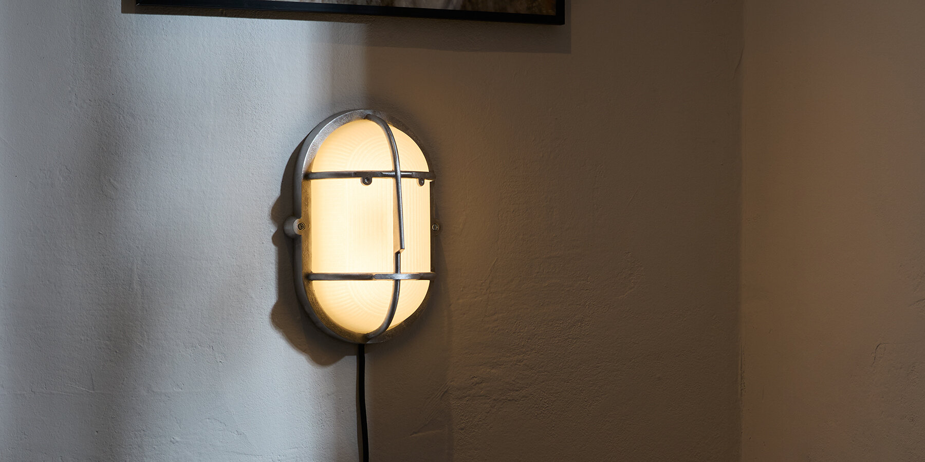 qb1-philippe-tabet-bulkhead-lamp-face-like-lighting-designboom-1800-2