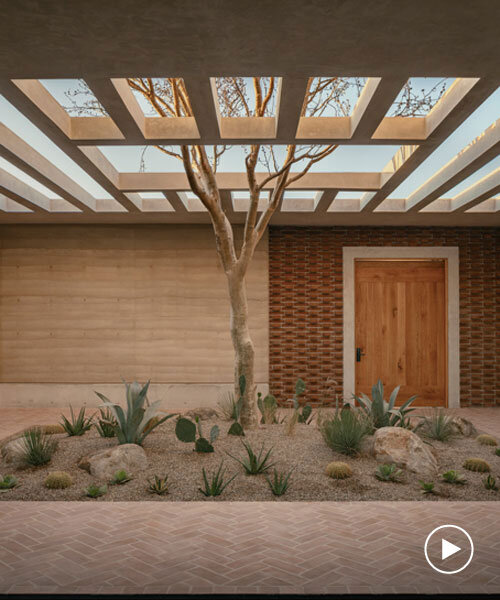 rammed-earth residence unfolds around central planted courtyard on mexico's coast