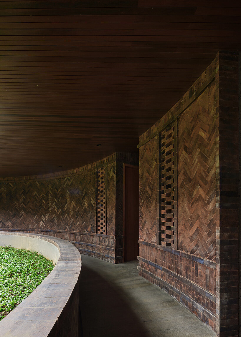 ring-shaped residence by alexis dornier wraps around verdant inner courtyard in bali