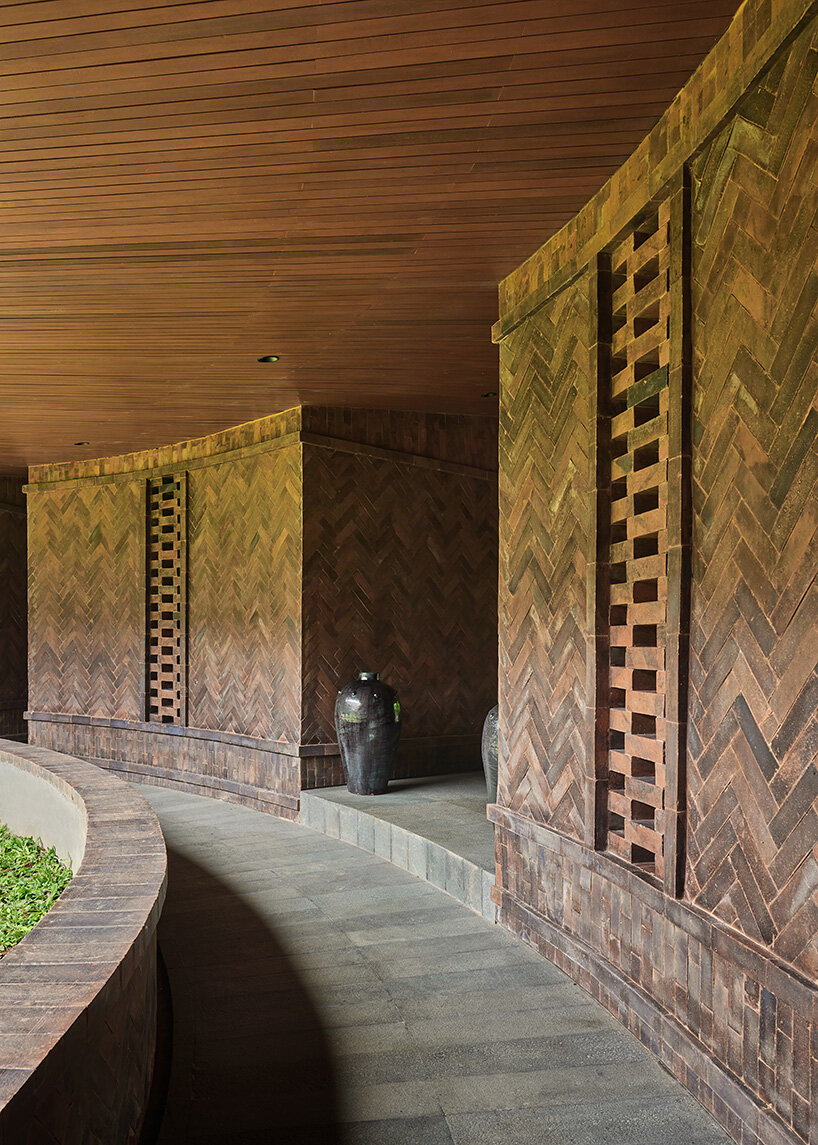 ring-shaped residence by alexis dornier wraps around verdant inner courtyard in bali