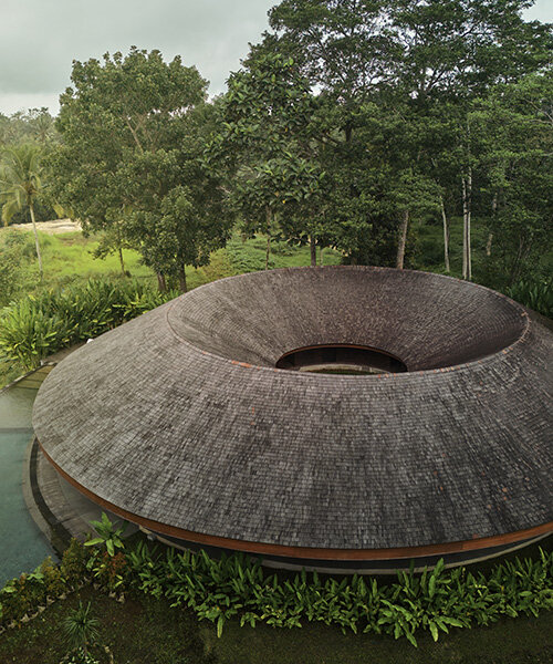 ring-shaped residence by alexis dornier wraps around verdant inner courtyard in bali