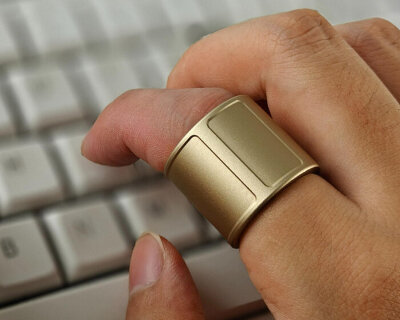 wearable mouse ring lets users control computers, smartphones and TVs using their finger