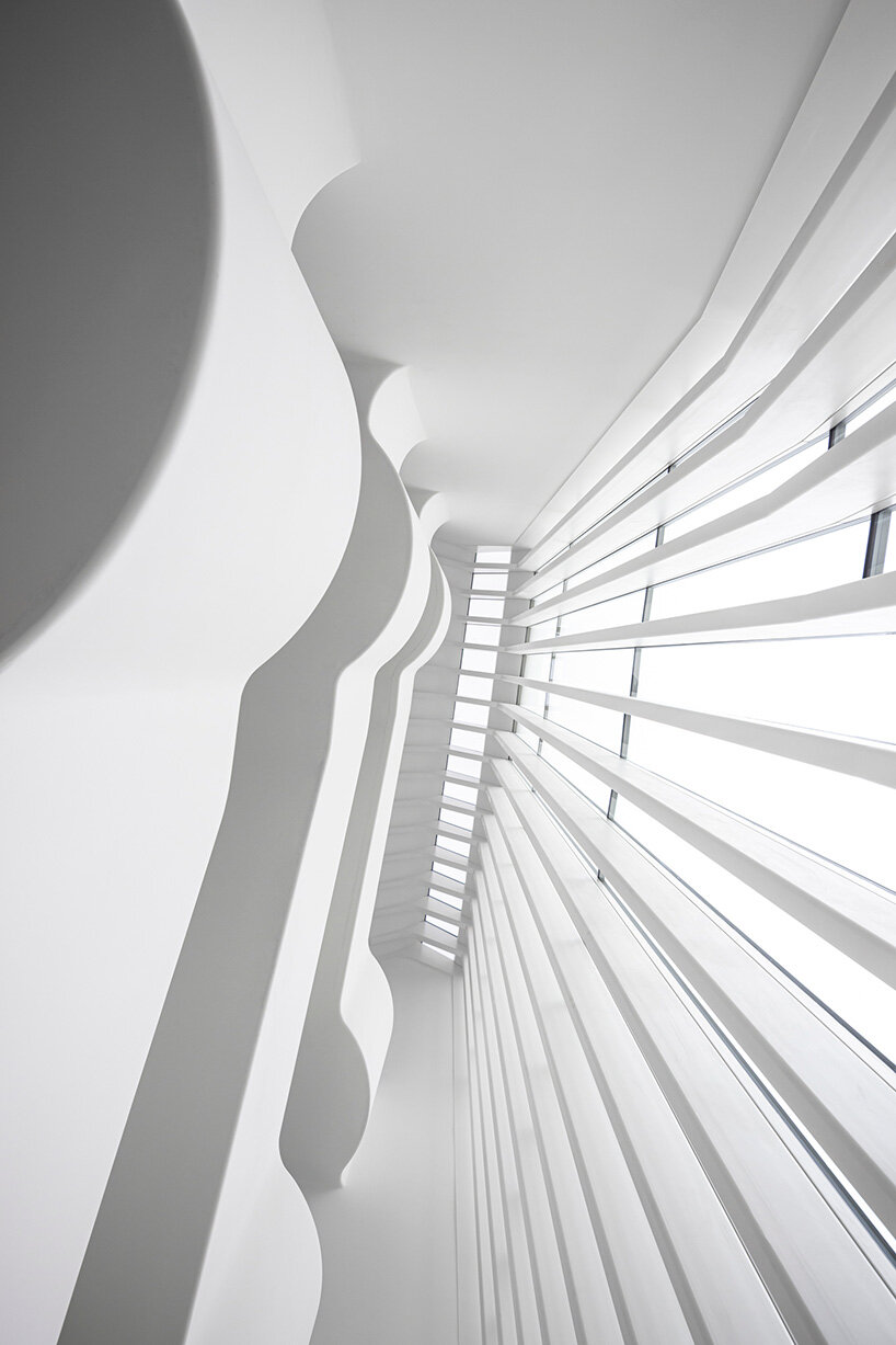 santiago calatrava sculpts haus zum falken in zurich with folded glass facade