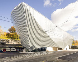 santiago calatrava sculpts haus zum falken in zurich with folded glass facade
