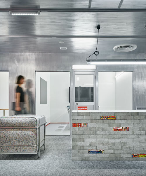 reflective aluminum evokes dynamic motion effects within manga studio in tokyo