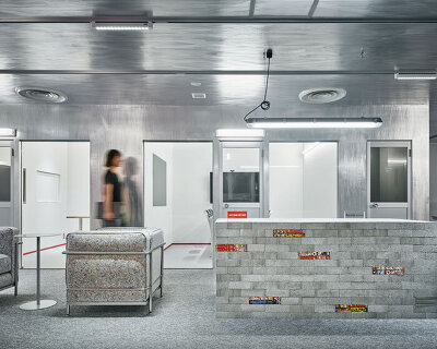 reflective aluminum evokes dynamic motion effects within manga studio in tokyo