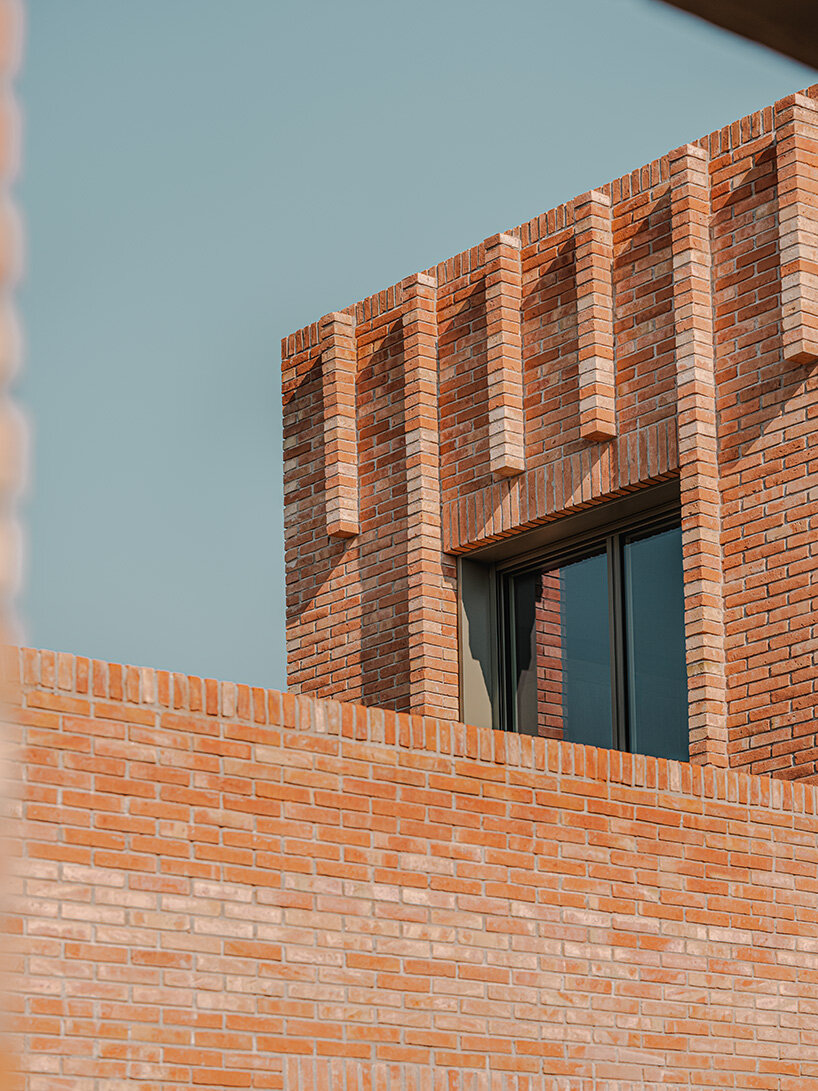 SIGLA studio organizes brick residence around two 'lungs' of light in spain