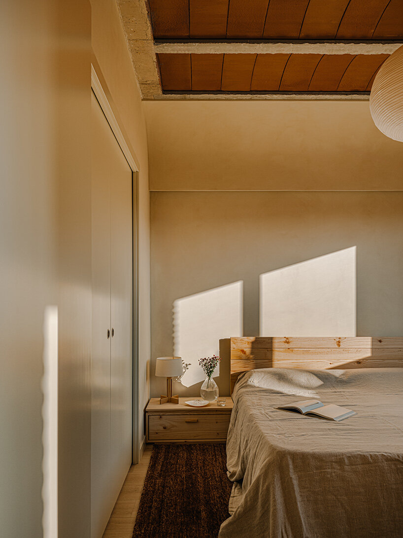 SIGLA studio organizes brick residence around two 'lungs' of light in spain