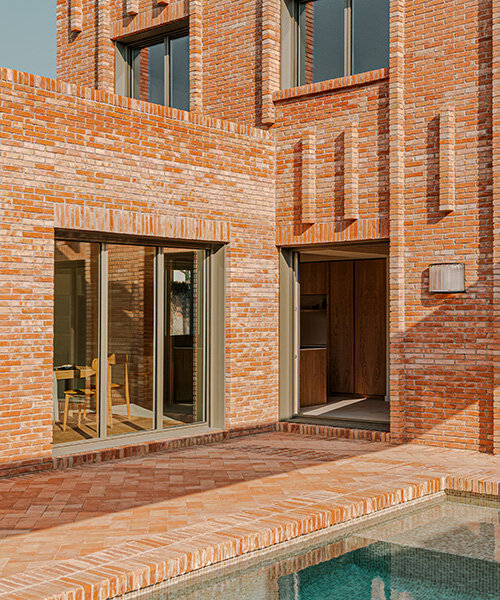 SIGLA studio organizes brick residence around two 'lungs' of light in spain