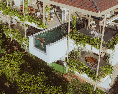 cantilevered swimming pool extends out from studio saxe's 'villa nuri' in costa rica