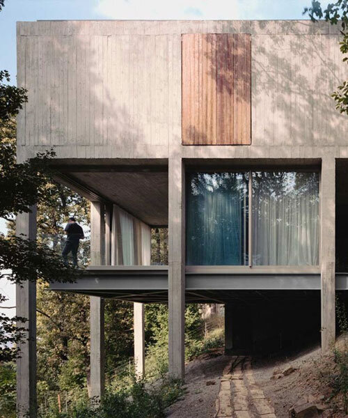 concrete columns lift residence above forested terrain in georgia