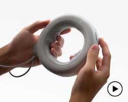 tuno ring-shaped DJ controller reimagines the deck as a portable donut device