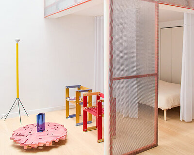 paf atelier + BB architectes organize paris apartment around perforated orange mezzanine