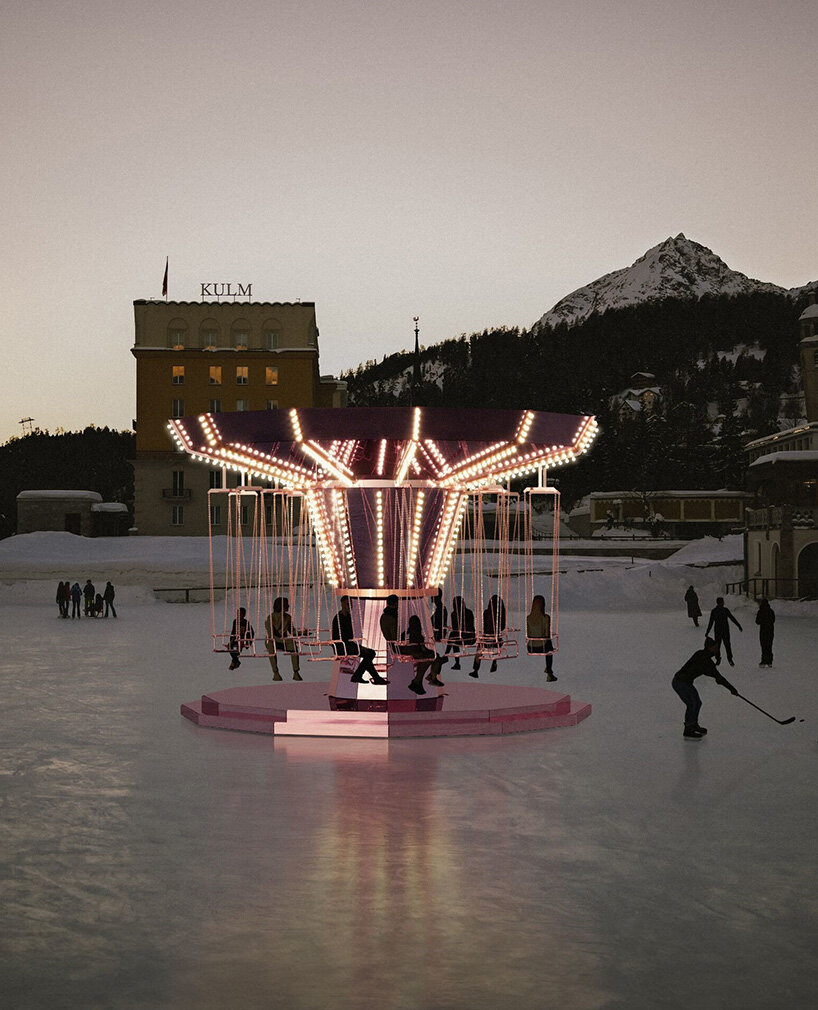 carsten höller's pink mirrored carousel slows time on the ice rink of the kulm hotel st. moritz