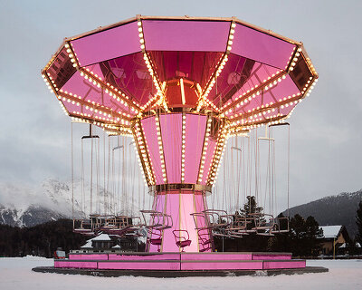 carsten höller's pink mirrored carousel slows time on the ice rink of the kulm hotel st. moritz