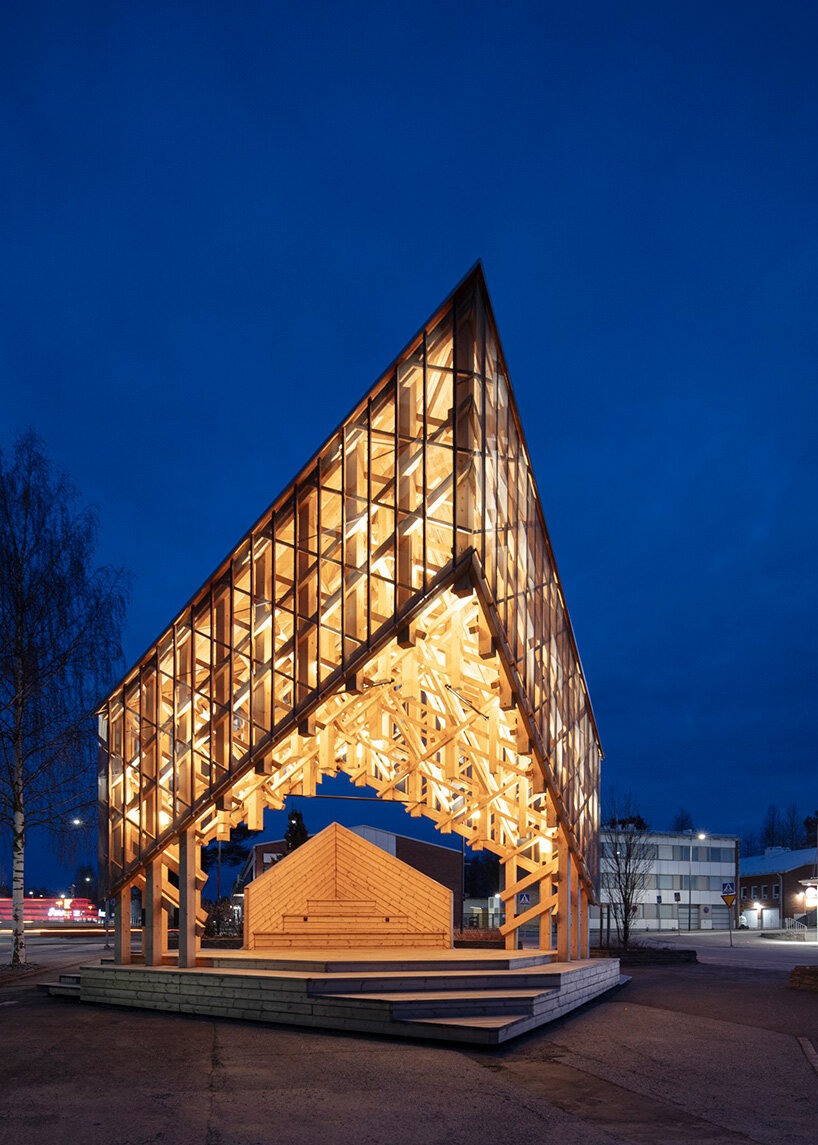 crystalline timber canopy inspired by snow fractals becomes a gathering space in finland