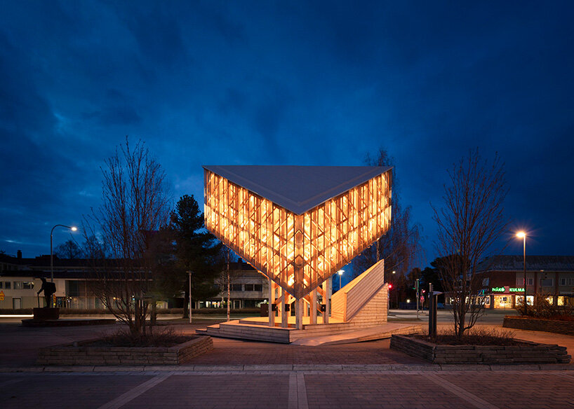 crystalline timber canopy inspired by snow fractals becomes a gathering space in finland