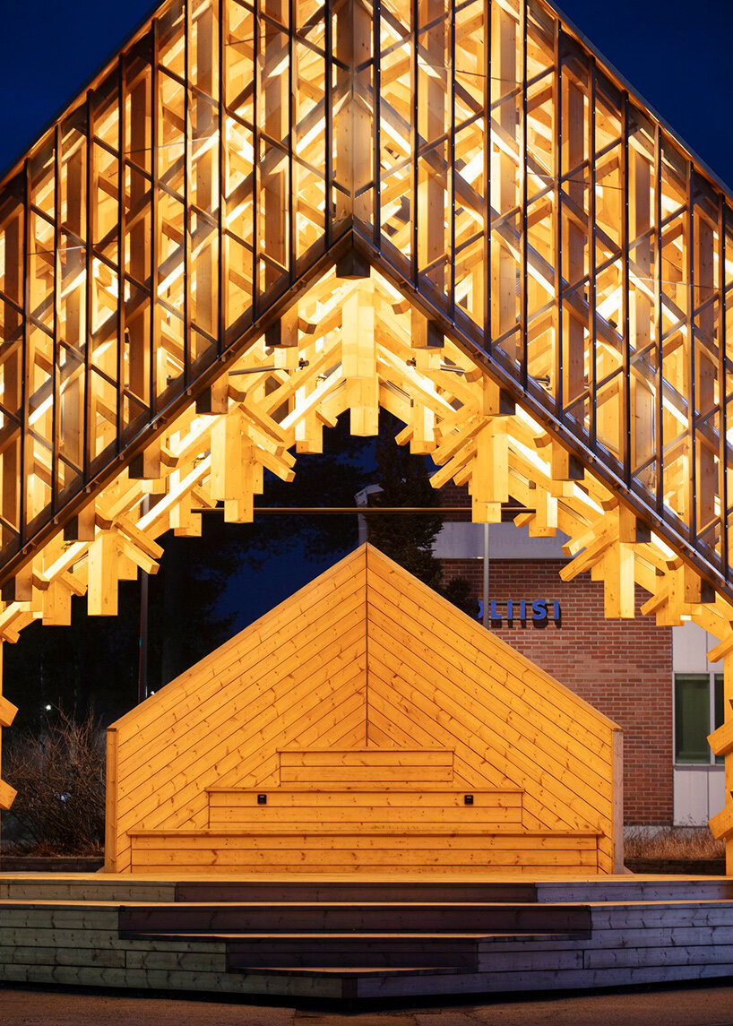 crystalline timber canopy inspired by snow fractals becomes a gathering space in finland