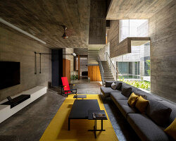 matharoo associates builds 'cut bend fold play house' from folded concrete planes in india