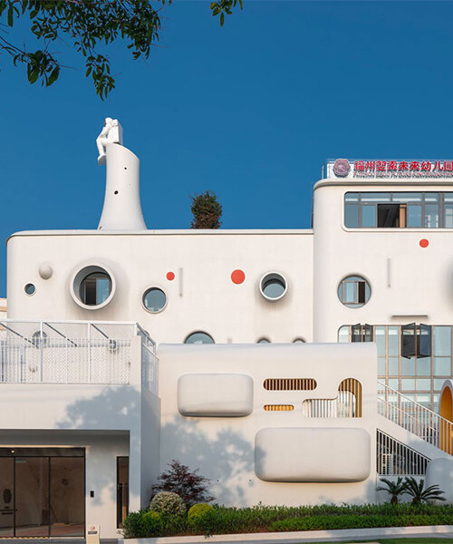 dika design shapes playful interstellar kindergarten crowned by astronaut sculpture