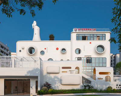 dika design shapes playful interstellar kindergarten crowned by astronaut sculpture