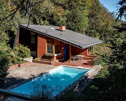 casa vernate: architect enrico sassi revisits a 1970s lake house in switzerland