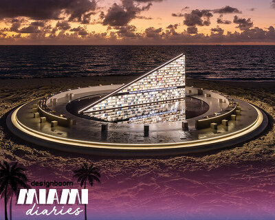 es devlin's triangular bookshelf rotates within a mirrored pool for miami art week 2025
