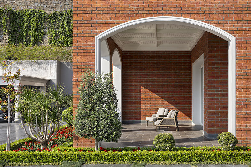 stepped residence embedded into the hillside maximizes views and privacy in india