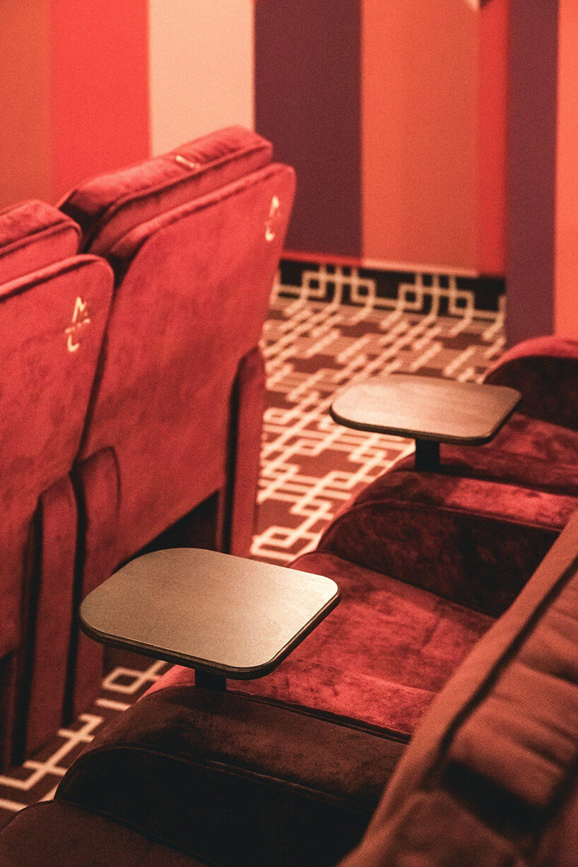 historic parisian cinema is reborn in wes anderson-like pastel hues and velvet touches