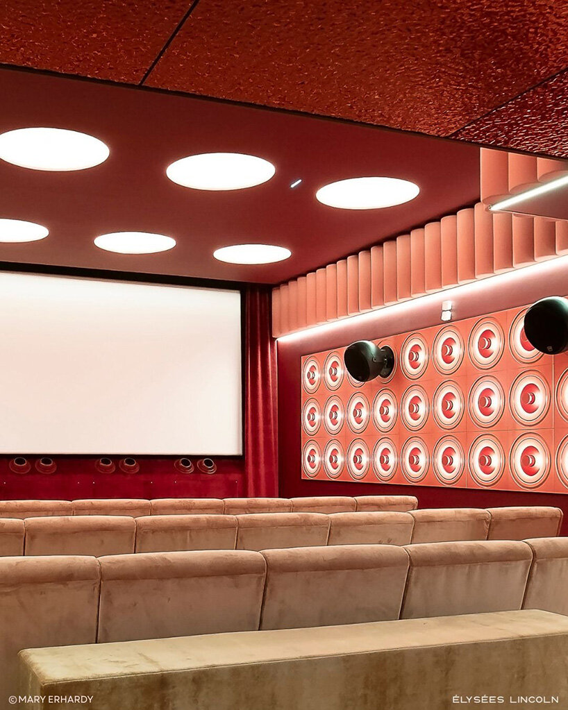 historic parisian cinema is reborn in wes anderson-like pastel hues and velvet touches